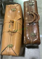 2 vintage leather suitcases - both are showing