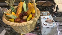 Large basket with fake fruit and vegetables and