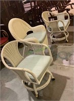 3 white wicker chairs - all with matching green
