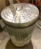 2 galvanized metal trash cans. Standard outdoor