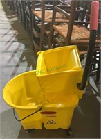 Rubbermaid yellow mop bucket  with the squeeze
