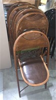 7 vintage wooden folding chairs with the burgundy