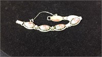 Jewelry - 7 inch bracelet with oval pinkish brown