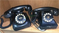 Newer pushbutton telephone and one vintage rotary