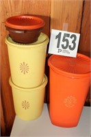 4 Tupperware Canisters
