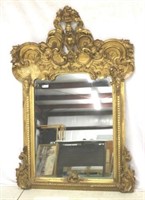 Heavily Carved & Gilded Antique Mirror