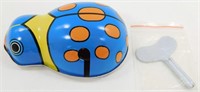 Wind-Up Rolling Lady Bug Tin Toy with Key & Works