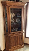 Oak corner china cabinet w/ beveled glass