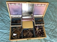 Large Tan jewelry box with jewelry