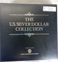 Silver dollar collection in album