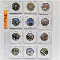 Twelve Clad JFK Half $1 w/WWII Comm Stickers