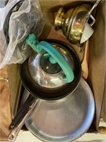 Box with tea kettle, cooking pans, coffee mug,