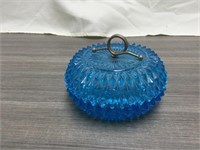 Blue glass covered candy dish