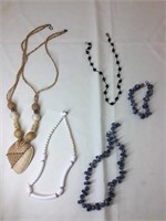 4 necklaces and one bracelet