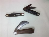 Three pocket knives