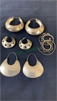 4 Pairs of silver earrings, all appear to be