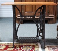 CAST IRON AND WOOD TABLE