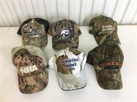 Six camouflage hats
