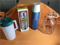 2 thermos, plastic pitcher and Dean’s glass milk