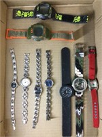 Box of women’s and men’s watches