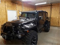 2016 Jeep Wrangler Unlimited Sport (5,458 miles)