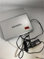 Toshiba Laptop and charger. Used. Untested.