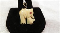 CARVED 14K GOLD AND RUBY ELEPHANT