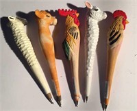 5 carved wood pens