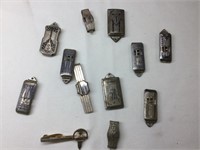 Antique metal tie clips and metal charms