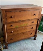 Antique four drawer dresser with a nice flamed