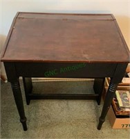 Small slant front work desk with plenty of