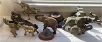 Herd of elephants - carved wood, ceramic, brass.