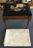 Antique footstool with a tapestry seat