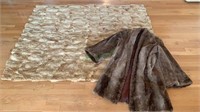 Antique animal fur lap blanket with a brown felt