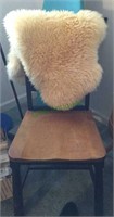 Nice wooden chair and sheepskin seat cushion