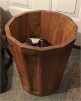 Carved wooden wastebasket with some ties and