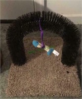 Carpeted cat scratching post