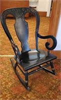Low sitting black & gold rocking chair
