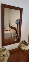 Wood framed mirror approx size is 18 x 31 inches