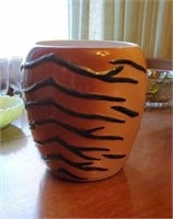 Tiger print vase approx 12 inches tall has a chip