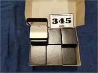 case of 12 earring boxes