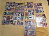 75 Baseball cards in plastic sheets
