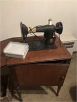 Singer Sewing Machine in Cabinet