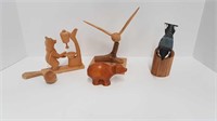 4 CARVED WOOD ORNAMENTS