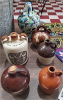 6 old pottery jugs Peters Reed Roycroft spongeware