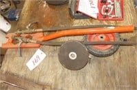 Orange Wrench, Wheel, Tape and Hoses