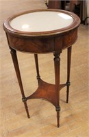 Round glass top parlor table