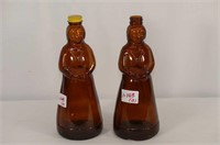 Pair of Amber Lady Figural Bottles