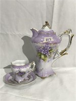 Porcelain Teapot with Cup and Saucer