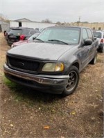 2003 Gray Ford F150 (K $85)